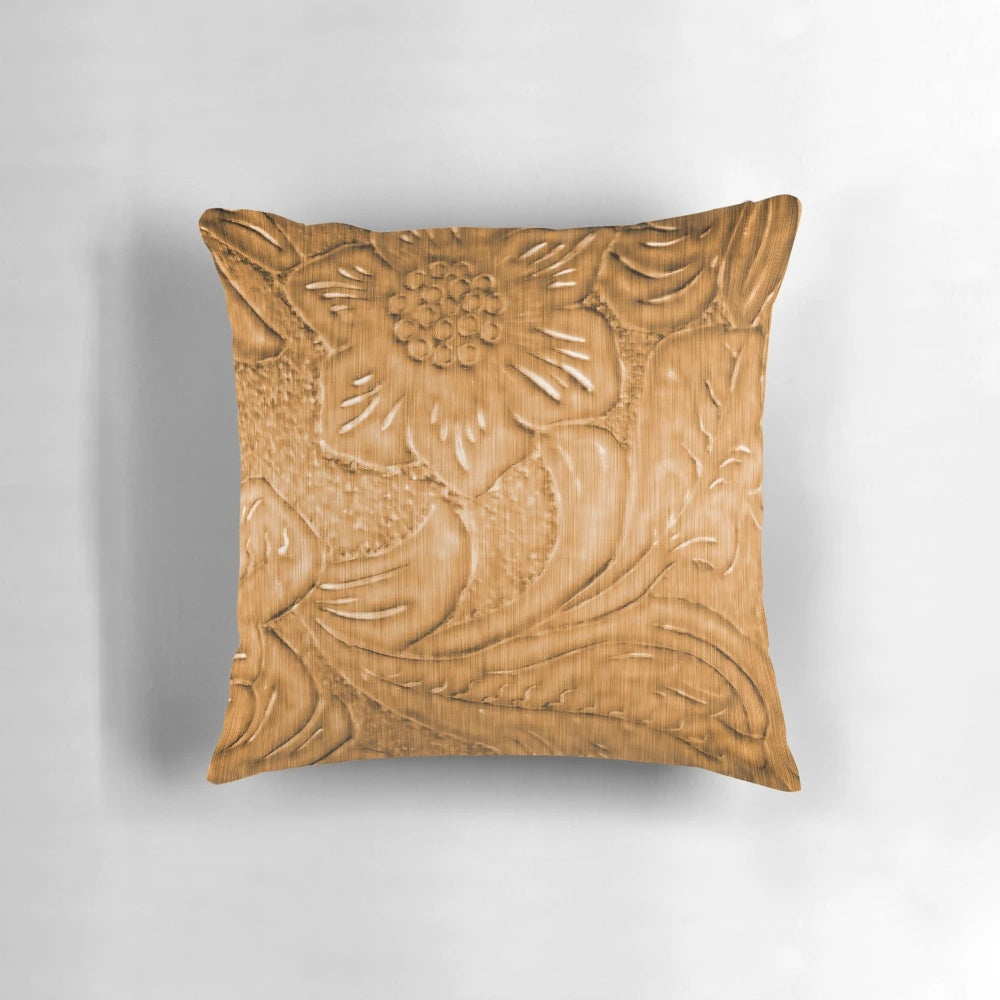Closeup of a tooled leather pattern decorative pillow with a rustic southwestern style.