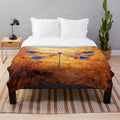 Dragonfly in amber plush blanket with a nature-inspired, distressed design