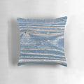 Rustic weathered wood effect pillow in blue tones, perfect for coastal and beach house decor