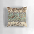 Rustic western country-style pillow cover with teal, brown, and beige tones