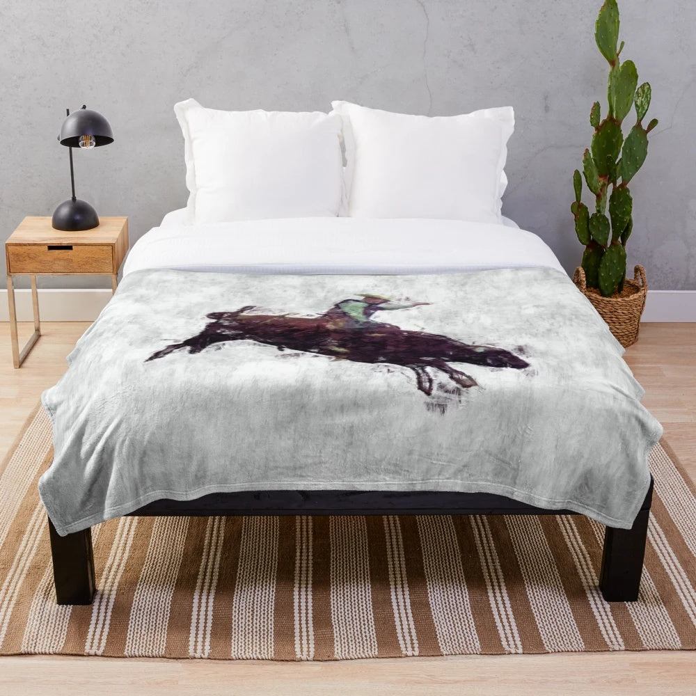 Rustic western-style plush blanket with rodeo cowboy and bull rider design