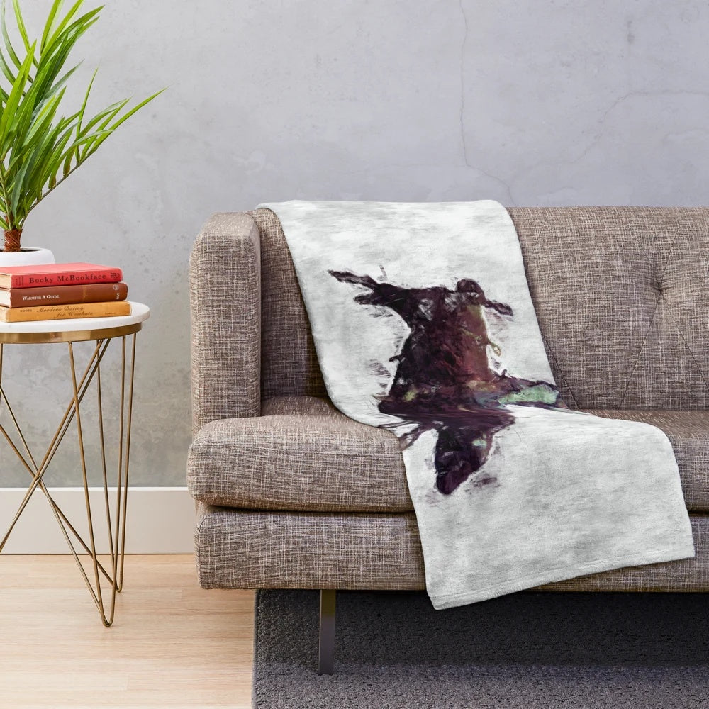 Rustic western-style plush blanket with rodeo cowboy and bull rider design