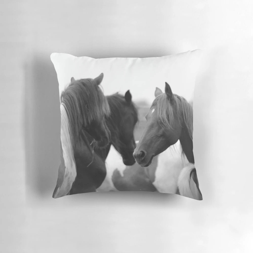 A black and white image of a wild horse, perfect for nature-inspired home decor.
