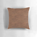 Closeup of a rustic wooden plank pillow with a distressed, grungy texture