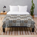 Rustic woodland patchwork plush blanket featuring deer design