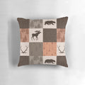 Rustic patchwork pillow in shades of brown, orange, and green featuring a woodland and wildlife design.