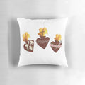 Three hearts pillow with sacred heart, chaste heart, and immaculate heart design