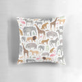 A colorful watercolor-style pattern featuring various safari animals like giraffes, zebras, and elephants on a throw pillow.