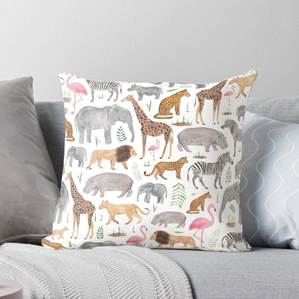 A colorful watercolor-style pattern featuring various safari animals like giraffes, zebras, and elephants on a throw pillow.