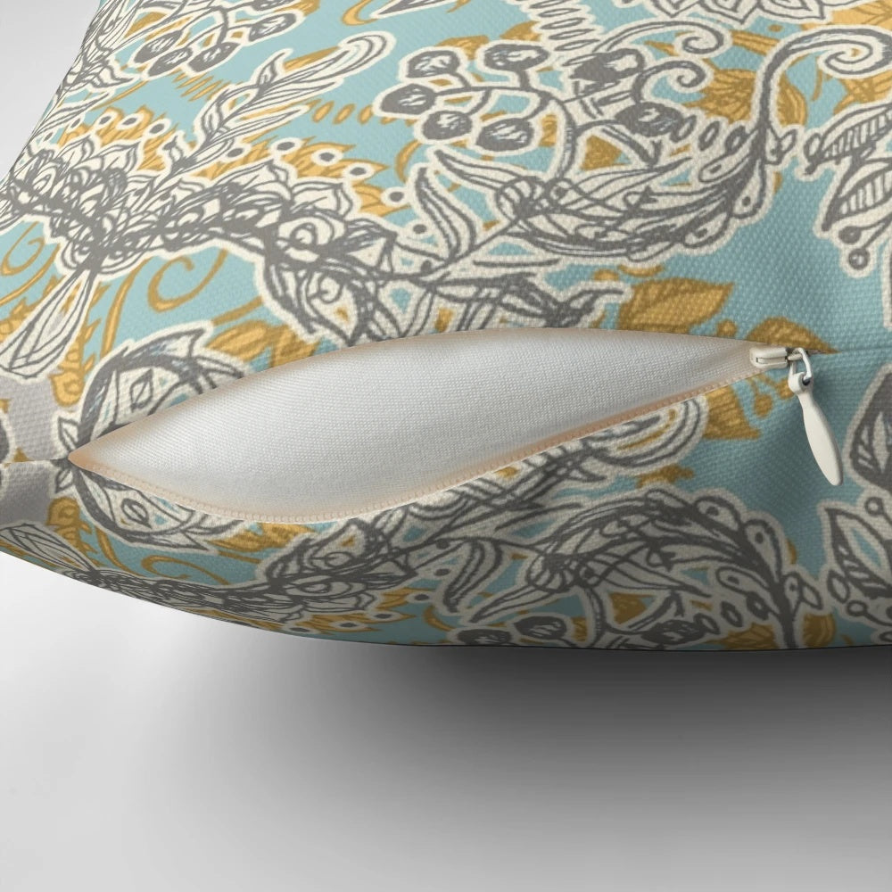 Gypsy floral pattern in soft neutral colors of grey, yellow, and sage on a decorative throw pillow.