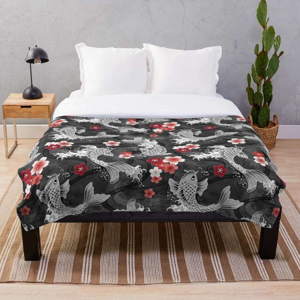 Sakura blossom and koi fish watercolor design on a cozy plush blanket