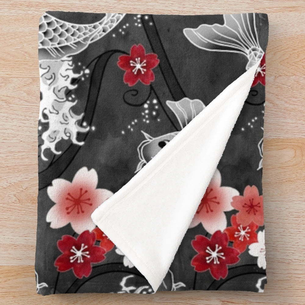 Sakura blossom and koi fish watercolor design on a cozy plush blanket