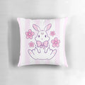 A pastel pink and white bunny pillow with cherry blossom petals, creating a magical and whimsical design.
