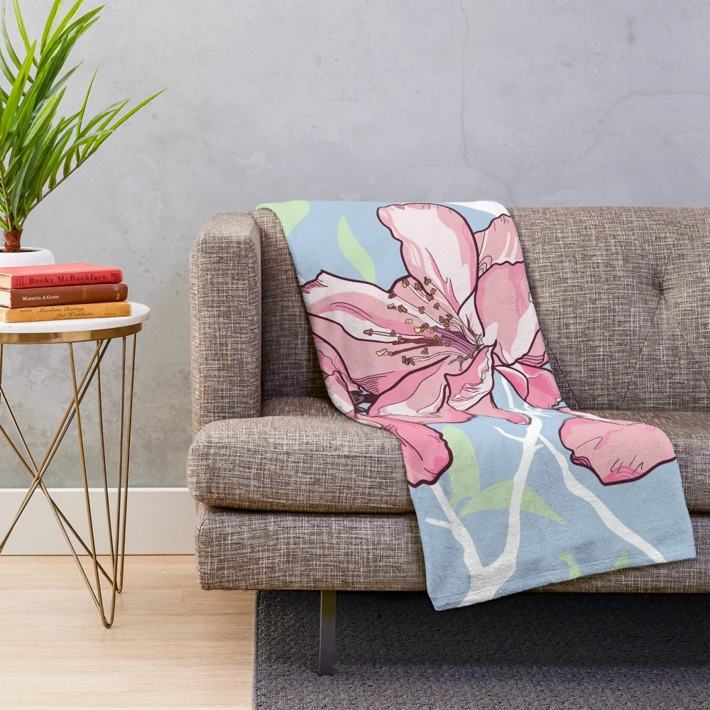 Soft and plush blanket featuring a beautiful sakura or cherry blossom design
