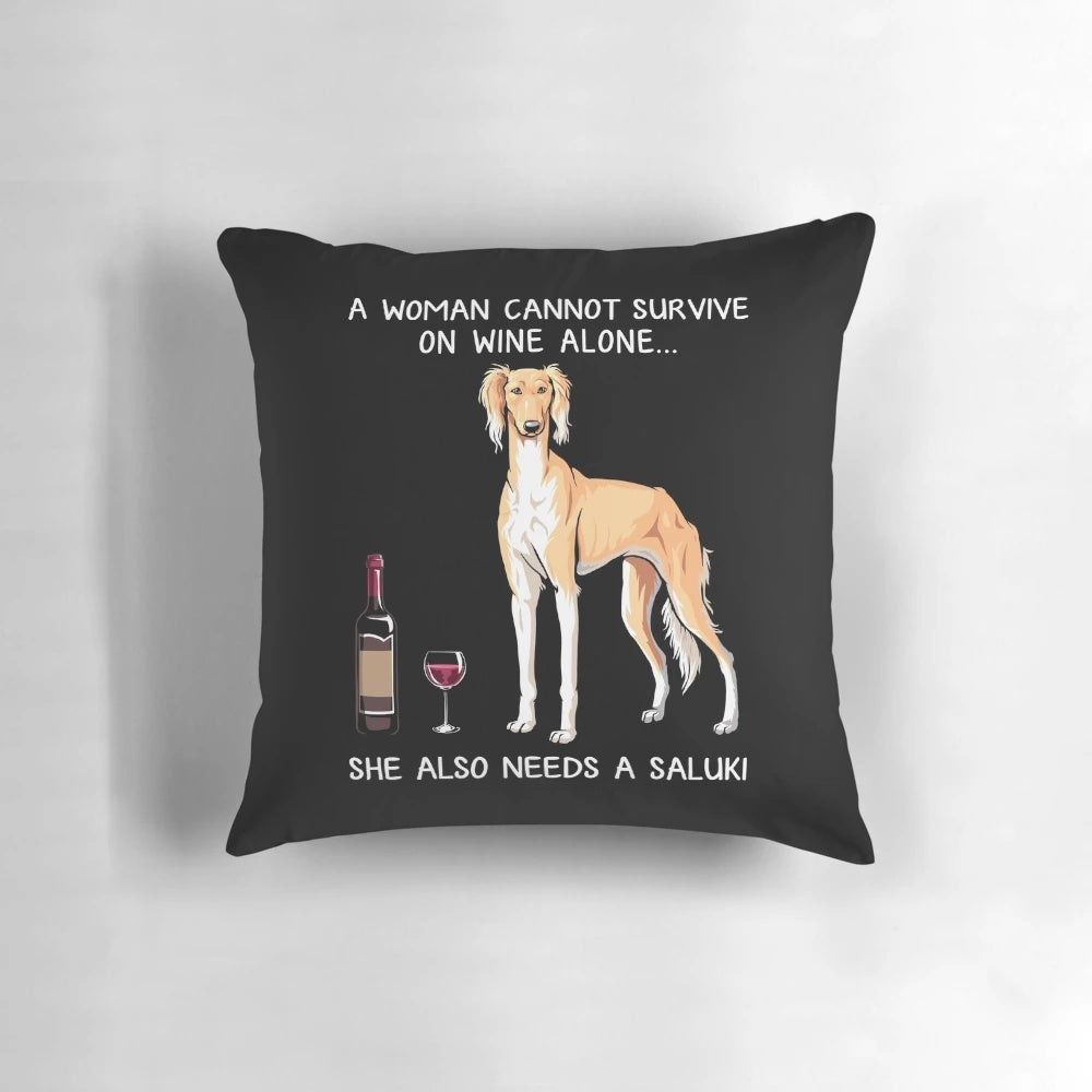 Saluki dog drinking wine on a decorative pillow