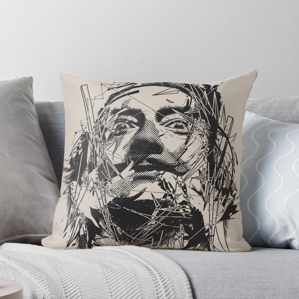 Graphically designed pillow featuring the iconic portrait and moustache of surrealist painter Salvador Dali