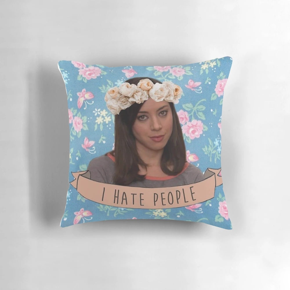 A sarcastic and humorous throw pillow featuring the character April Ludgate from the TV show Parks and Recreation.