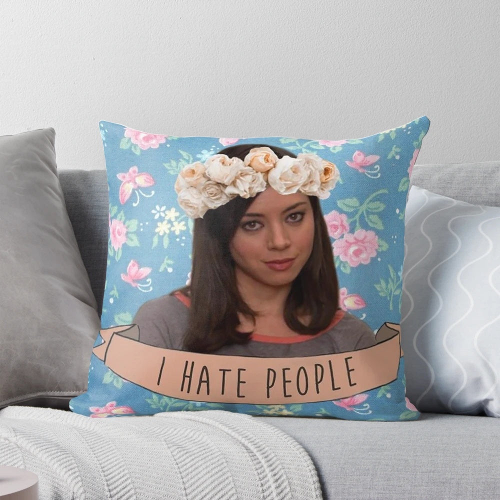 A sarcastic and humorous throw pillow featuring the character April Ludgate from the TV show Parks and Recreation.