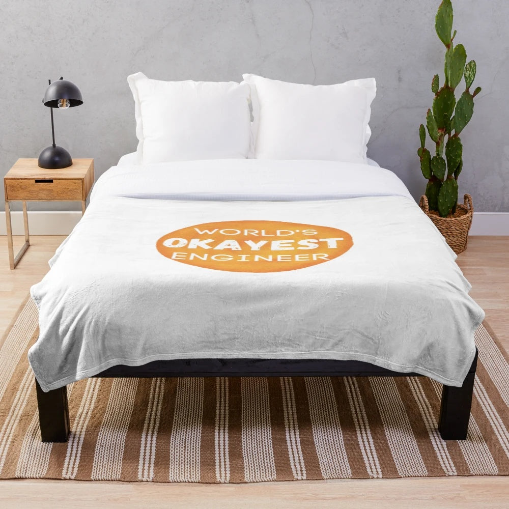 World's Okayest Engineer" plush blanket - a humorous and ironic gift for engineers