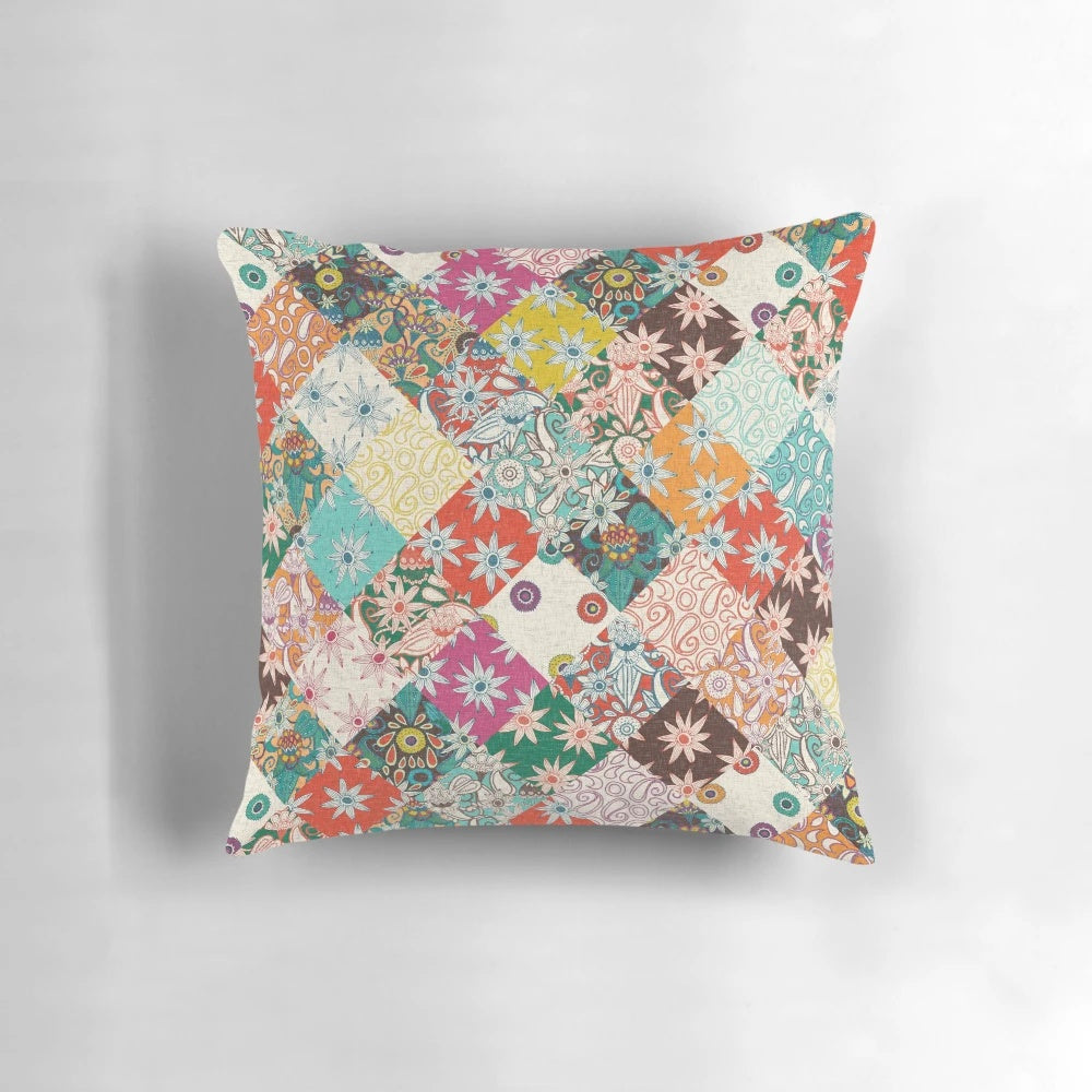 Sarilmak patchwork pillow featuring a vibrant floral and bohemian design