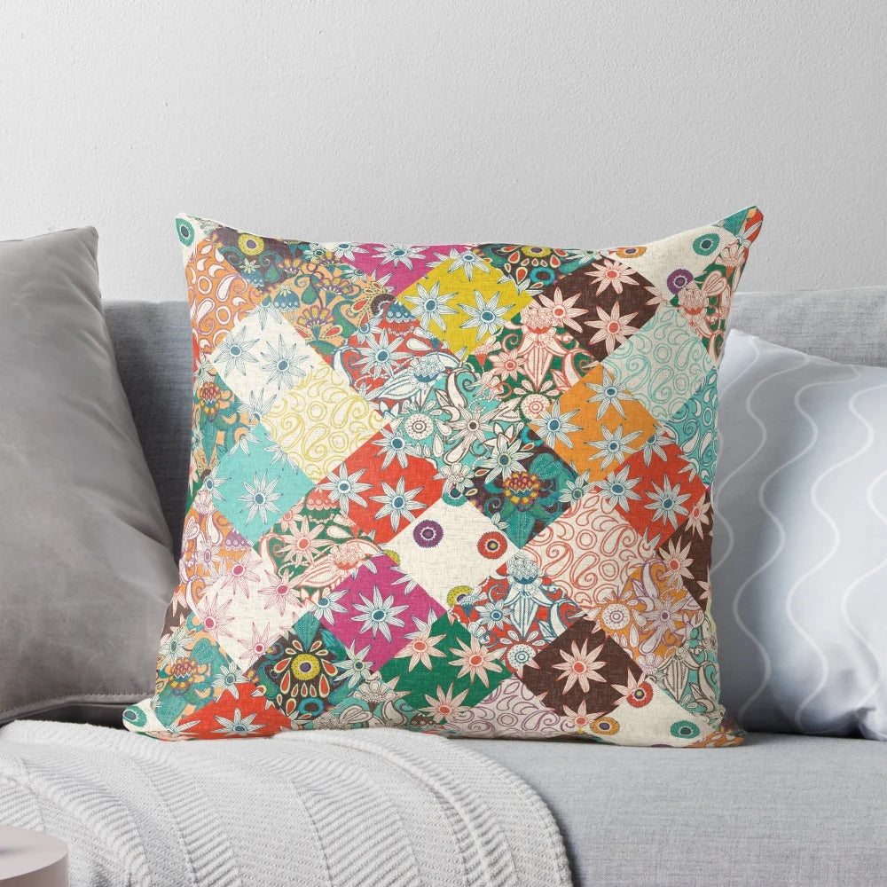 Sarilmak patchwork pillow featuring a vibrant floral and bohemian design