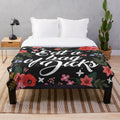 Sassy floral plush blanket with a humorous insulting quote