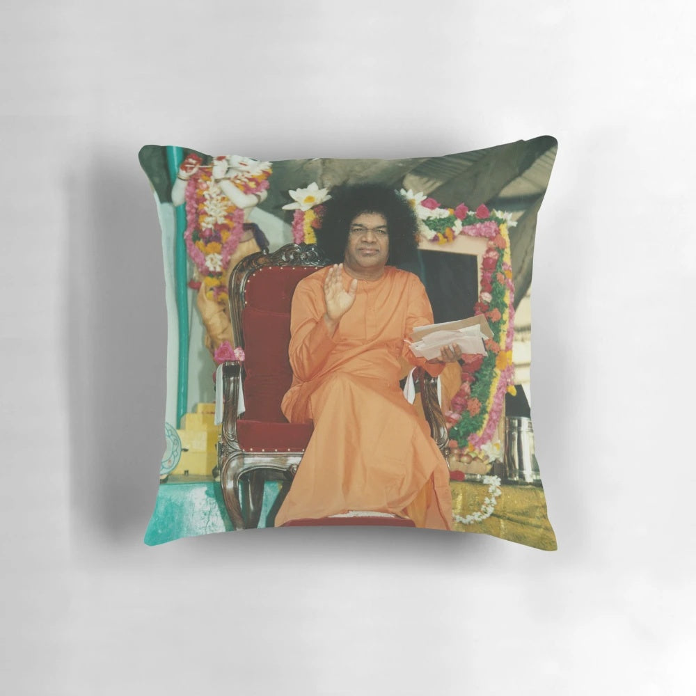 Sathya Sai Baba sitting in a meditation pose, printed on a high-quality pillow