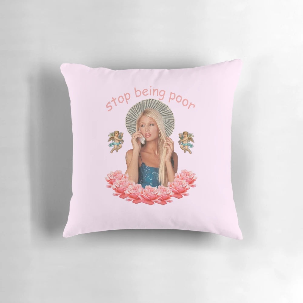 Satirical "Stop Being Poor" pillow with pop art inspired design featuring Paris Hilton