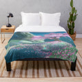 Satori Mountain inspired plush blanket with video game art design