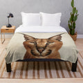 Caracal cat artwork printed on a plush, cozy blanket
