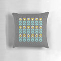 Stylish Scandinavian-inspired floral pattern pillow in shades of yellow, gray, and teal