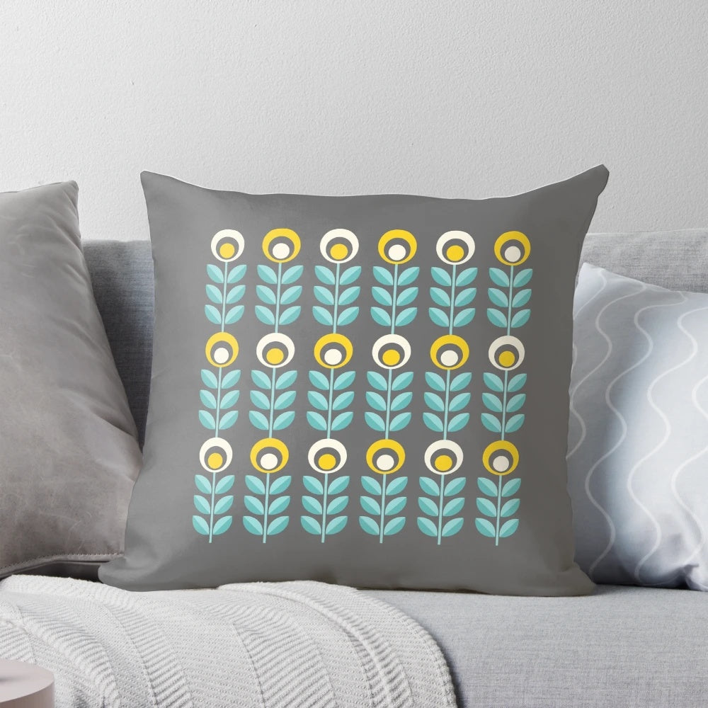 Stylish Scandinavian-inspired floral pattern pillow in shades of yellow, gray, and teal