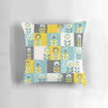Scandinavian-inspired floral pattern pillow in shades of yellow, gray, and teal