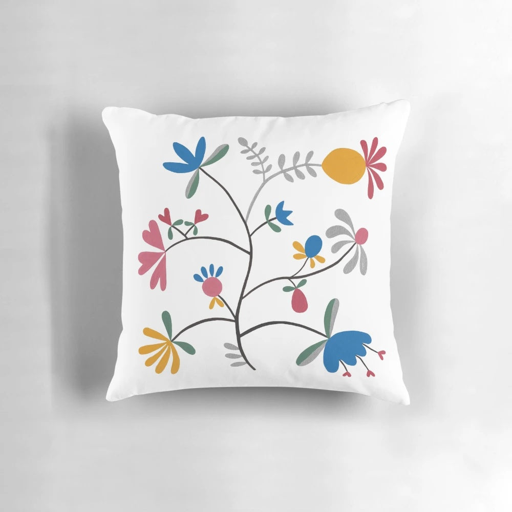 Vibrant Scandinavian folk art inspired pillow with a blue bell flower kurbits design