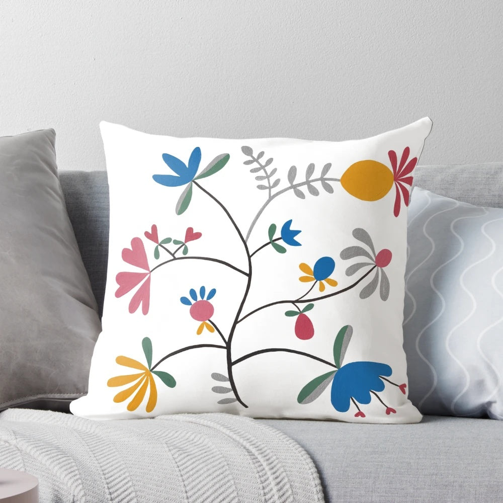 Vibrant Scandinavian folk art inspired pillow with a blue bell flower kurbits design