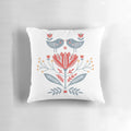 Decorative throw pillow featuring Scandinavian-inspired folk art design with birds and flowers