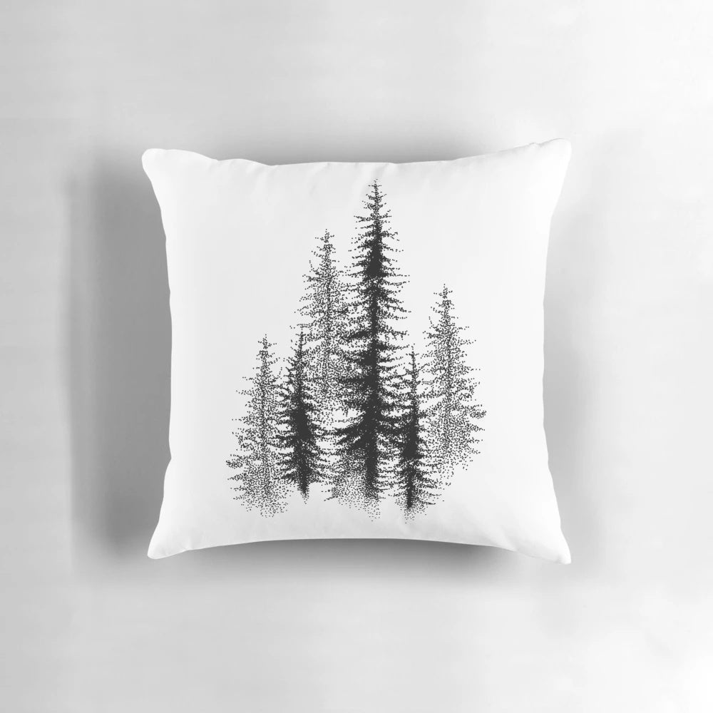 Dotwork black and white pillow design featuring a scandinavian forest landscape.