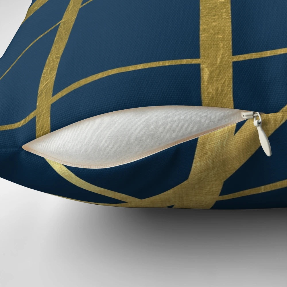 Scandinavian-inspired geometric navy and gold decorative pillow