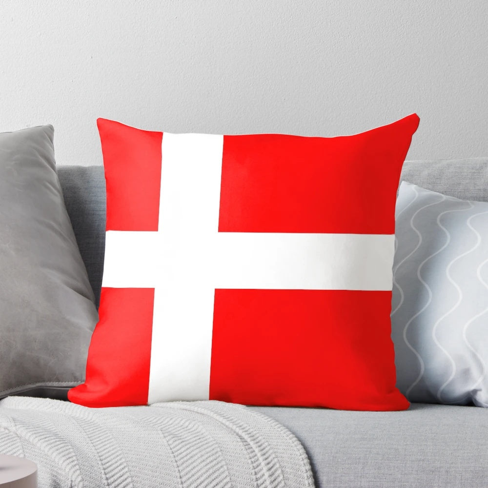 Cozy Danish flag-inspired throw pillow featuring the iconic red and white colors of the Scandinavian nation.