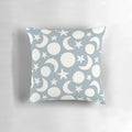 Cream and blue decorative pillow with a minimalist moon and stars pattern, perfect for Scandinavian-inspired home decor.