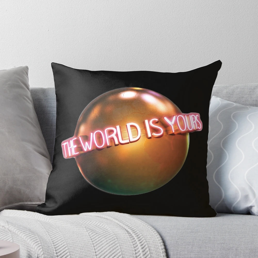 Scarface-themed throw pillow featuring the quote "The World Is Yours" from the iconic film