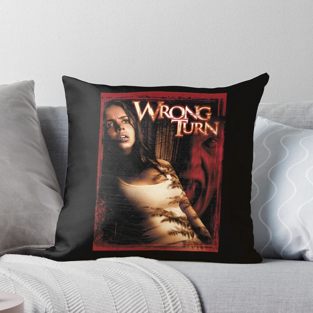 A plush pillow featuring the "Wrong Turn" horror movie logo and imagery, ideal as a birthday gift for fans of slasher films.