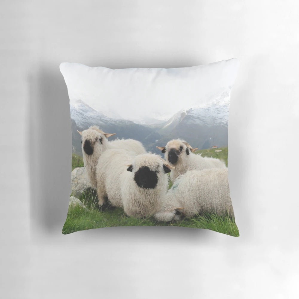 Black nose sheep in the Swiss Alps, a cozy mountain-inspired pillow design