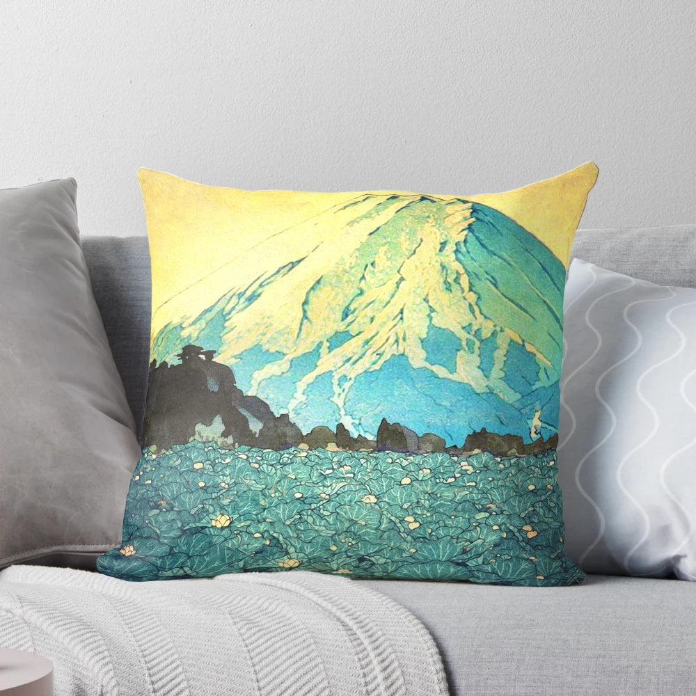 Serene landscape pillow featuring a mountain lake with water lilies, forests, and a golden sunset sky reflection