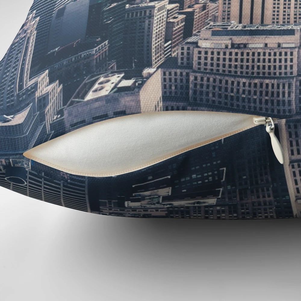 Decorative throw pillow featuring a cityscape of the New York City skyline with the iconic Empire State Building on a foggy day