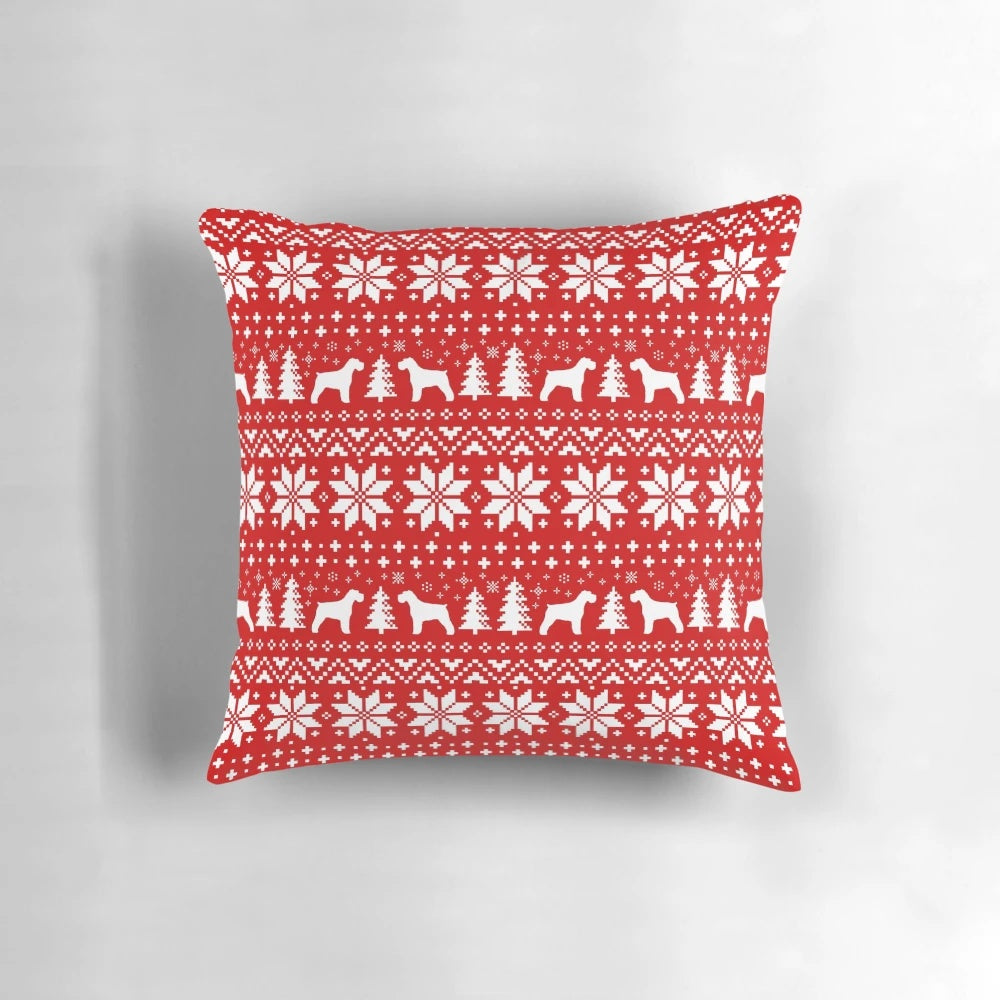 Schnauzer silhouette Christmas pillow featuring a festive sweater pattern