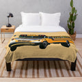 Cozy school bus themed plush blanket