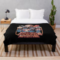 A plush blanket featuring a sci-fi inspired space adventure design with cartoon characters