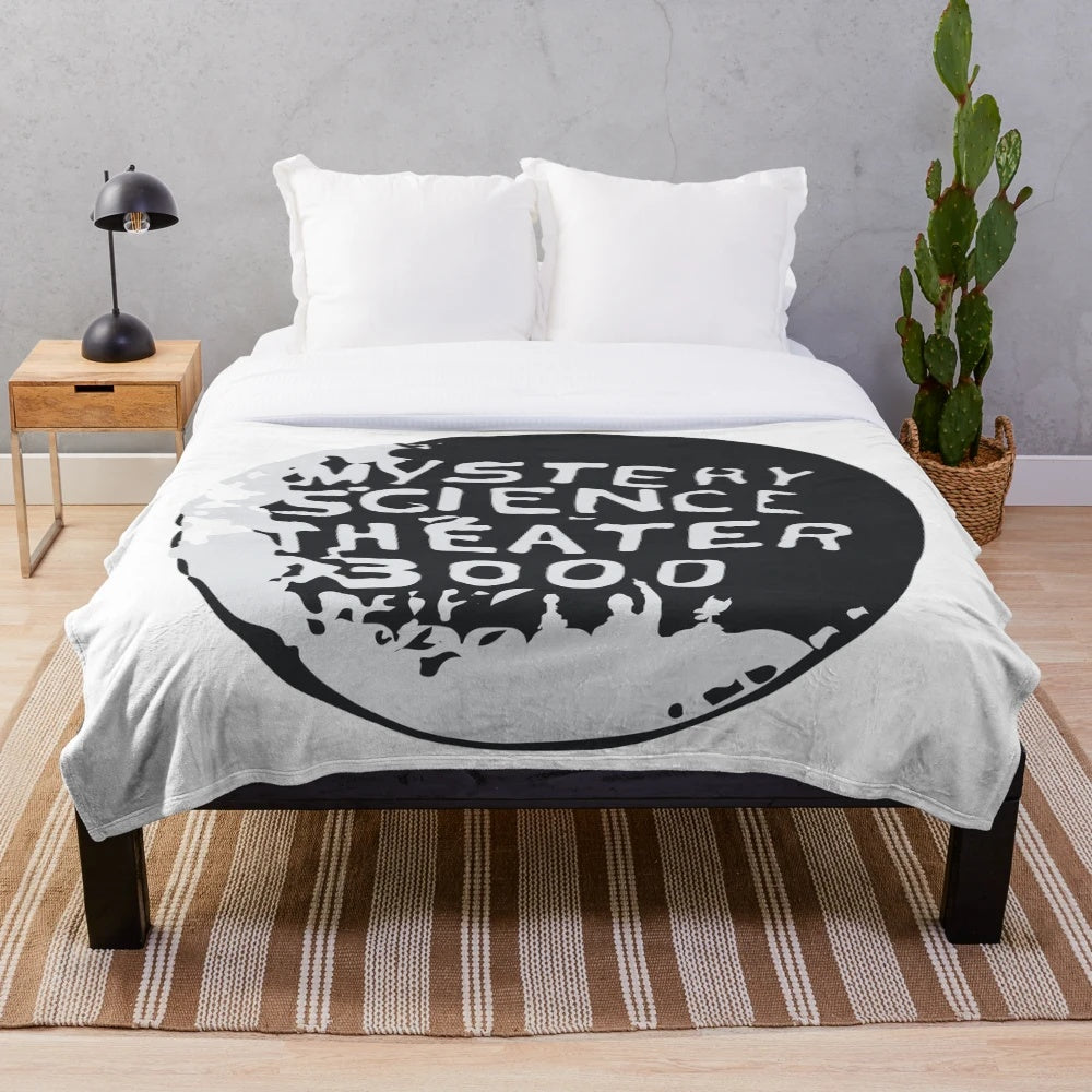 MST3K inspired plush blanket with silhouette design within a globe
