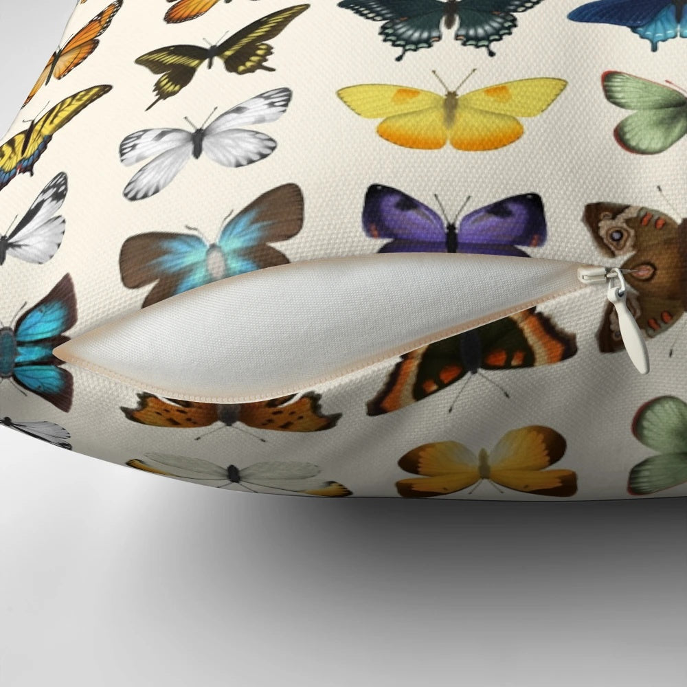 Decorative throw pillow featuring a detailed, scientifically accurate illustration of various butterfly species found in North America.
